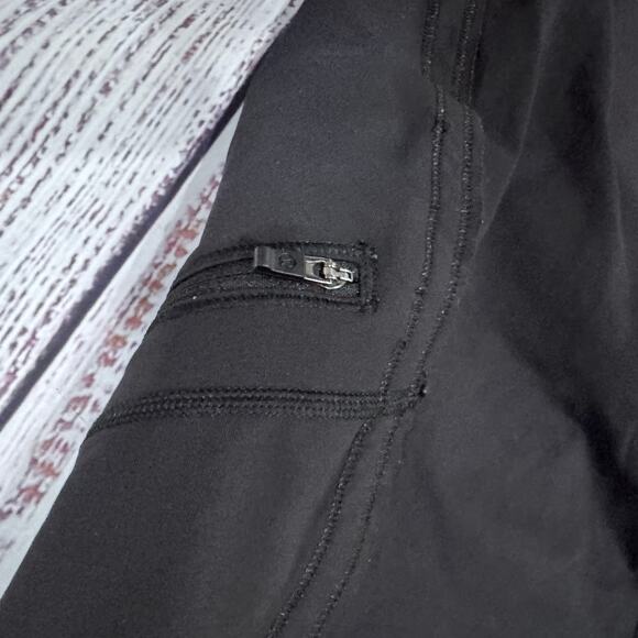 lululemon Black High Rise Crop Leggings Size 4 Zip Pocket 17” Inseam - Picture 3 of 7